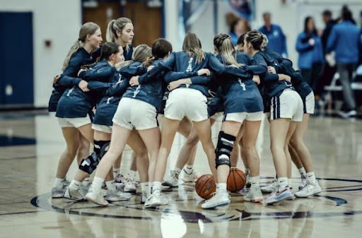 The Lady Cougars Basketball Team